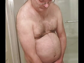 Nude Martin Lavallee mastubates, ejaculates and eats his sperm